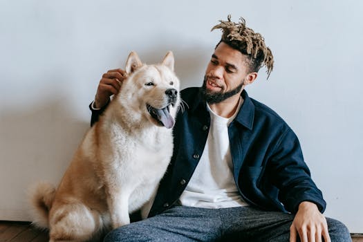 happy service dog with owner